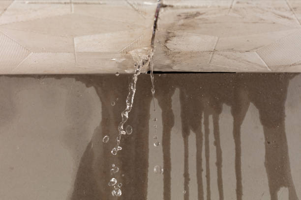 Professional Flood Damage Cleanup technician working in New Hampton, NH